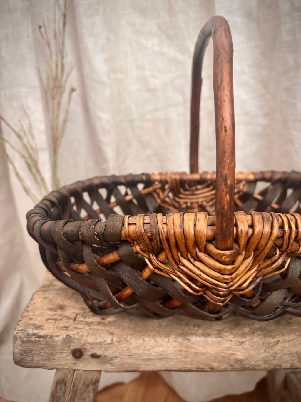 Vintage French-Style Woven Basket With Bentwood Handle